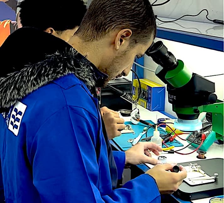 Hands-on device repair training at Atlanta Training Center